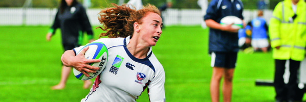 Ashley English running with a rugby ball